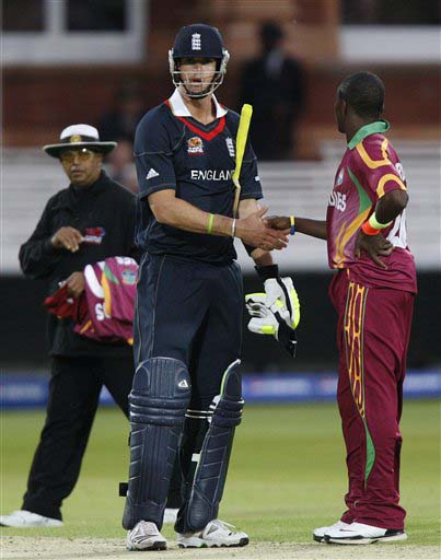 England's Kevin Pietersen mistakenly shakes hands with West Indies' Fidel Edwards one run before the end of the match during their warm-up Twenty20 World Cup match at Lord's cricket ground in London, on Wednesday. (AP Photo) Eng vs WI warm-up match