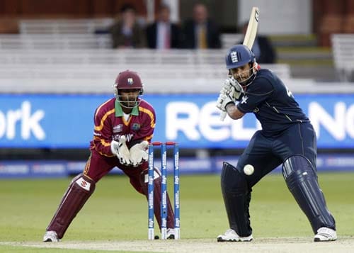 England's Ravi Bopara plays a shot off the bowling of West Indies' Sulieman Benn as wicket keeper Denesh Ramdin looks on during their warm-up Twenty20 World Cup match at Lord's cricket ground in London, on Wednesday. (AP Photo) Eng vs WI warm-up match