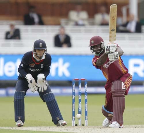 West Indies' Xavier Marshall plays a shot watched by England's James Foster during their Twenty20 match prior to the start of the ICC World Twenty20 at Lord's cricket ground in London, on Wednesday. (AFP Photo) Eng vs WI warm-up match