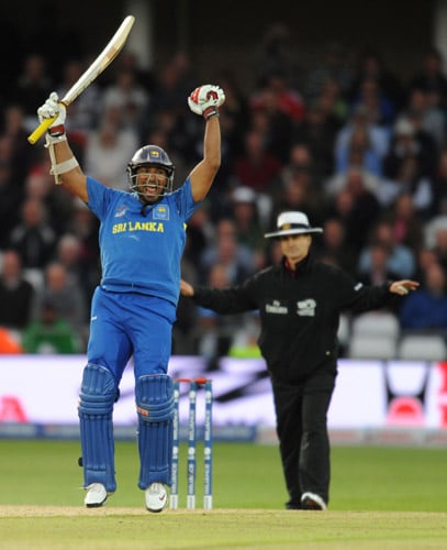 Sri Lanka's Kumar Sangakkara celebrates after beating Australia in the World Twenty20 match at Trent Bridge in Nottingham. (AFP Photo) WT20: AUS vs SL