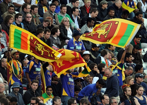 Sri Lankan supporters celebrate an Australian dismissal during the World Twenty20 match at Trent Bridge in Nottingham. (AFP Photo) WT20: AUS vs SL