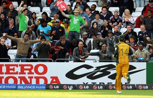 Sri Lanka supporters taunt Australia captain Ricky Ponting as he retrieves the ball during the World Twenty20 match at Trent Bridge in Nottingham. (AFP Photo) WT20: AUS vs SL