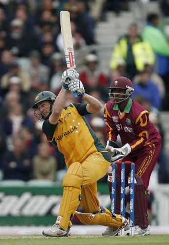 David Hussey of Australia hits a six during their ICC World Twenty20 match against the West Indies at The Oval in London. (AFP Photo) WT20: AUS vs WI