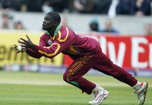 Andre Fletcher of the West Indies catches David Hussey for 27 runs during their ICC World Twenty20 match against Australia at The Oval in London. (AFP Photo) WT20: AUS vs WI