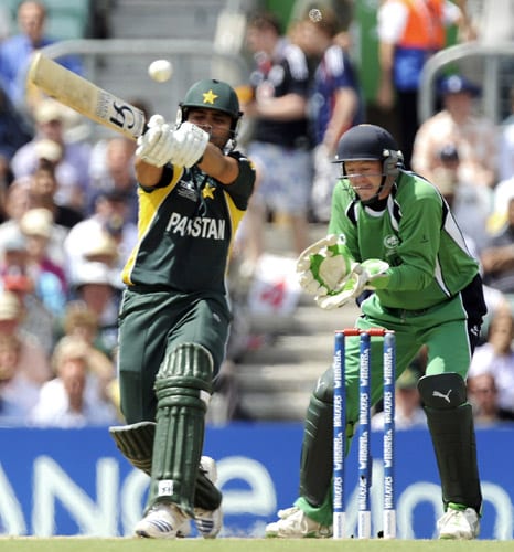 Kamran Akmal plays a shot as Niall O'Brien reacts during their ICC World Twenty20 match at the Oval in London. (AFP Photo) WT20: PAK vs IRE