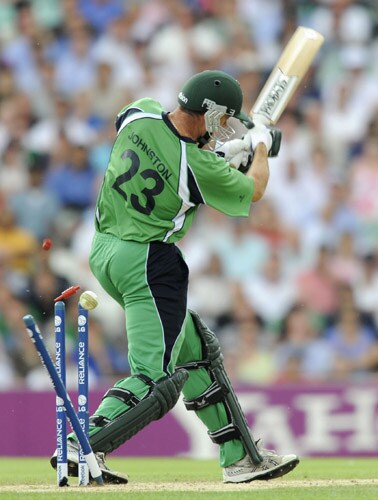 Trent Johnston misses his shot and gets bowled for a duck against Pakistan during an ICC World Twenty20 match at the Oval in London. (AFP Photo) WT20: PAK vs IRE