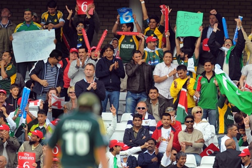 Supporters celebrate a six from Shahid Afridi against South Africa during the ICC World Twenty20 semi-final match at Trent Bridge in Nottingham. (AFP Photo) WT20: SA vs PAK