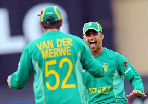 Jean-Paul Duminy congratulates Roelof van der Merwe after he caught out Shahzaib Hasan for 0 runs during the ICC World Twenty20 semi-final match at Trent Bridge. (AFP Photo) WT20: SA vs PAK