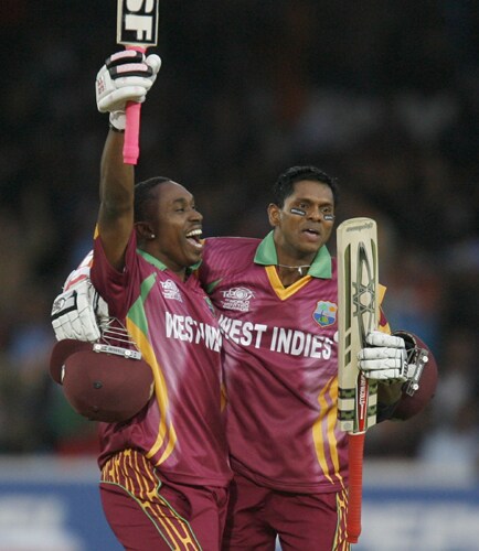 Dwayne Bravo celebrates getting the winning runs with Shivnarine Chanderpaul and beating India during the ICC World Twenty20 match at Lord's in London. (AFP Photo) WT20: IND vs WI