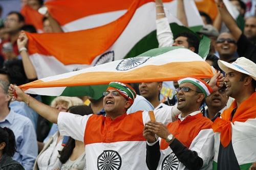 Indian fans cheer during the match against the West Indies in the ICC World Twenty20 at Lord's in London. (AFP Photo) WT20: IND vs WI