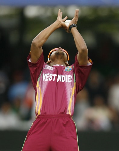 Lendl Simmons catches out Rohit Sharma during the ICC World Twenty20 match at Lord's in London. (AFP Photo) WT20: IND vs WI