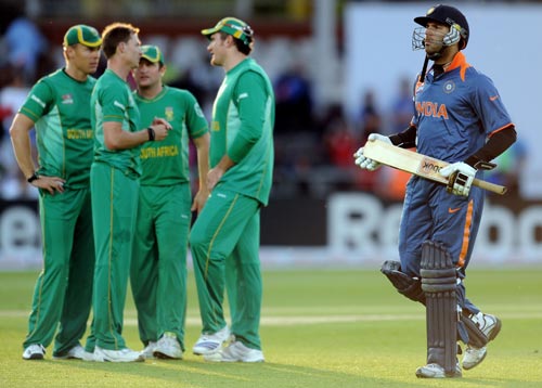 Yuvraj Singh leaves the field during the Super Eight stage of the ICC World Twenty 20 cricket match against South Africa at Trent Bridge on June 16, 2009. South Africa beat India by 12 runs in the final Group E match. (AFP Photo) WT20: IND vs SA