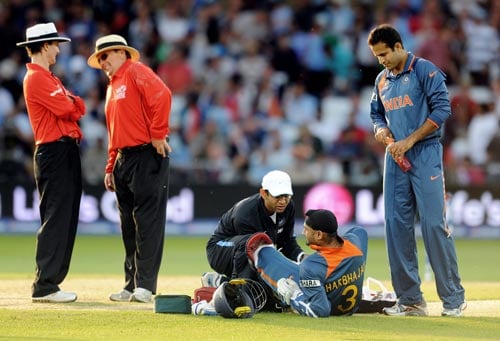 Harbhajan Singh receives treatment during the Super Eight stage of the ICC World Twenty 20 match against South Africa at Trent Bridge on June 16, 2009. (AFP Photo) WT20: IND vs SA