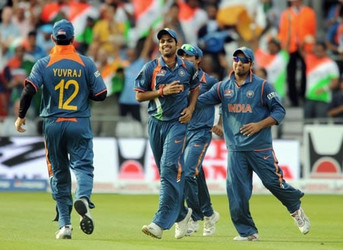 RP Singh celebrates catching the ball of South Africa's Mark Boucher during the Super Eight stage of the ICC World Twenty 20 match at Trent Bridge on June 16, 2009. Favourites South Africa struggled against India's bowling attack to manage just 130-5 in the last Super Eights match. (AFP Photo) WT20: IND vs SA