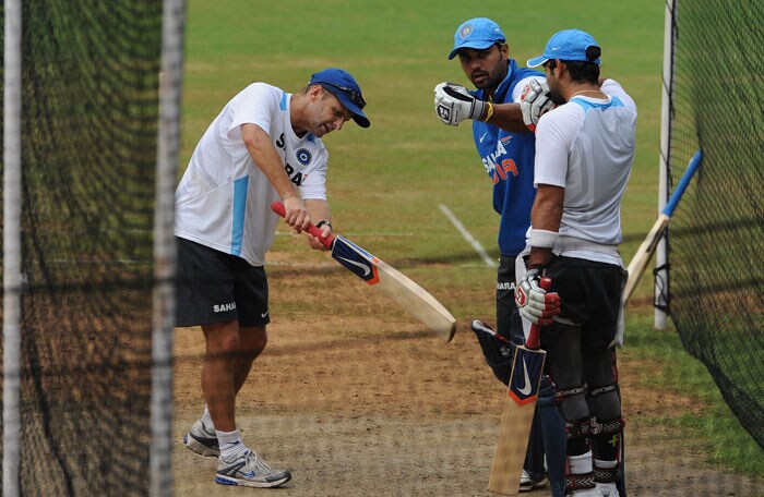 Indian cricket coach Gary Kirsten (L) gives batting tips to players Murali Vijay (C) and Virat Kohli (R).(AFP Photo) Ind vs Aus 3rd ODI: Teams' training session