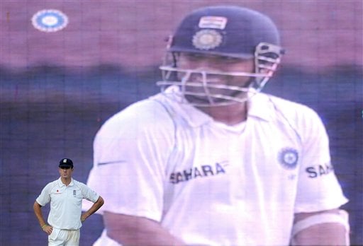Kevin Pietersen looks on as an image of Sachin Tendulkar is seen on a video screen on the fifth day of the first cricket Test match against in Chennai on Monday December 15, 2008. <br><br>Tendulkar is the third Indian and the sixth batsman to amass 1,000 runs this year - the top six being Virender Sehwag (1445), Graeme Smith (1363), VVS Laxman (1071), Sachin Tendulkar(1047), Hashim Amla (1012) and Neil McKenzie (1002). (AP Photo) Tendulkar's way to 41st ton
