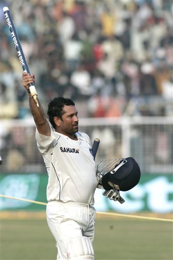 Sachin Tendulkar celebrates his century and India's victory during the fifth day of the first Test cricket match between India and England in Chennai on Monday, December 15, 2008. Tendulkar hit the winning runs and reached his 41st Test hundred with a swept boundary as India set a record for a victorious fourth-innings run chase on home soil to beat England by six wickets in the first cricket Test. (AP Photo) Tendulkar's way to 41st ton