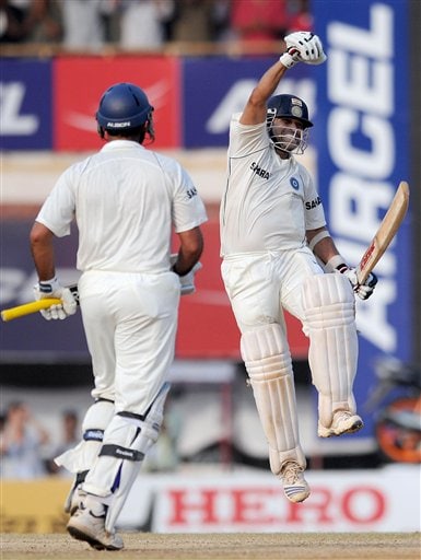 Sachin Tendulkar celebrates scoring a 100 runs and winning the match on the fifth day of the first cricket Test match against in Chennai on Monday December 15, 2008. (AP Photo) Tendulkar's way to 41st ton