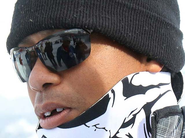 Toothless Tiger Woods Romances Vonn on Italian Peak