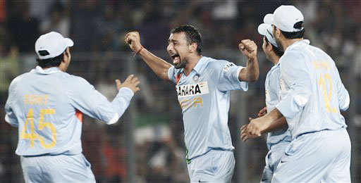 India's Praveen Kumar celebrates the dismissal of Pakistan's Younis Khan during their ODI match in Dhaka, Bangladesh on June 10, 2008. (AP Photo) 2nd ODI: India vs Pakistan