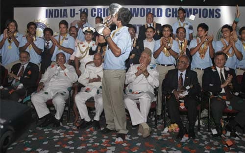 India Under-19 captain Virat Kohli kisses the U-19 World Cup at a felicitation function for the victorious team in Bangalore on Tuesday. India Under-19 Celebrations