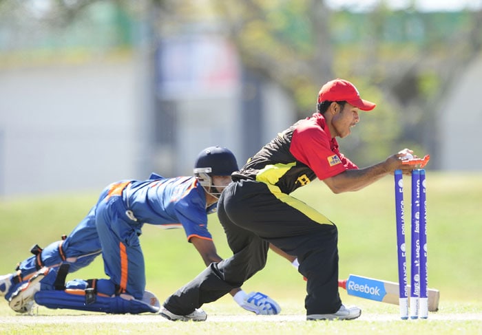 Baba Aparajith too went early, run out for 14 by Sese Bau of Papua New Guinea.
(Photo by Ian Hitchcock-ICC/Getty Images) Under-19 World Cup: India beat PNG, face Pakistan in quarter-final