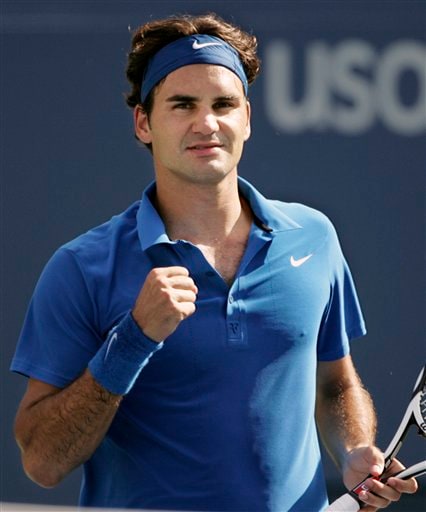 Roger Federer of Switzerland pumps his fist after winning a point against Scoville Jenkins of the United States during the first round of the US Open tennis tournament in New York, Monday, Aug. 27, 2007. US Open - Day 1