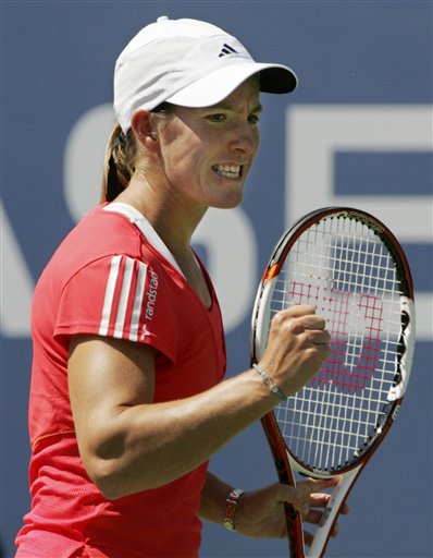 Justine Henin of Belgium reacts after winning a point against Julia Goerges of Germany during the first round of the US Open tennis tournament in New York, Monday, Aug. 27, 2007. US Open - Day 1