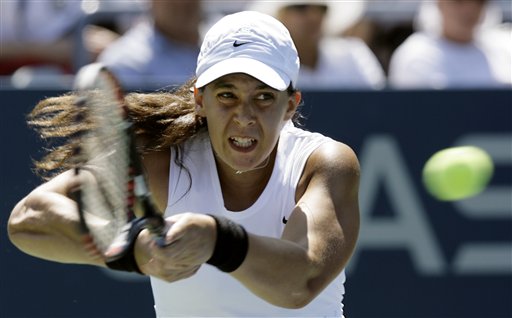 Marion Bartoli of France returns a shot to Alexa Glatch of the United States during the first round of the US Open tennis tournament in New York, Monday, Aug. 27, 2007. US Open - Day 1