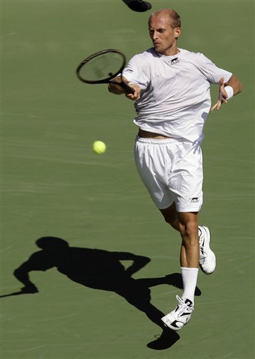 Nikolay Davydenko of Russia returns a shot to Jesse Levine of the United States during the first round of the US Open tennis tournament in New York, Monday, Aug. 27, 2007. US Open - Day 1