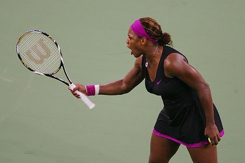 Serena Williams argues a call by the line judge which led to her disqualification during the women's singles semi-final match against to Kim Clijsters of Belgium on day thirteen of the 2009 US Open in New York. (AFP Photo) US Open Day 13