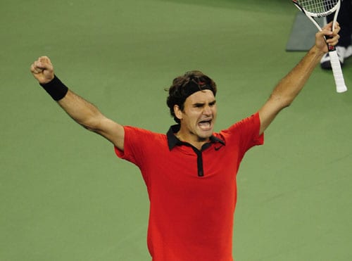 Tennis player Roger Federer from Switzerland celebrates after winning against Novak Djokovic from Serbia during their semifinals match of the 2009 US Open in New York. Federer won 7-6, 7-5, 7-5 to reach the final. (AFP Photo) US Open Day 14