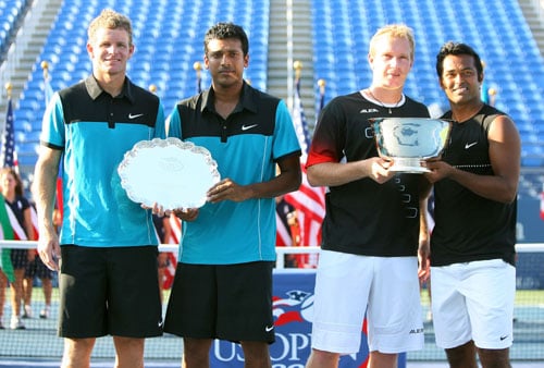 Mark Knowles of the Bahamas, Mahesh Bhupathi of India, Lukas Dlouhy of the Czech Republic and Leander Paes of India pose with the championship trophies after the men's doubles final of the 2009 US Open in New York. (AFP Photo) US Open Day 14