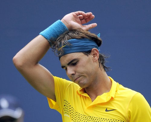 Third seed Rafael Nadal of Spain reacts during his US Open 6-2, 6-2, 6-2 semifinal loss to sixth-seeded Argentinian Juan Martin Del Potro in New York. (AFP Photo) US Open Day 14