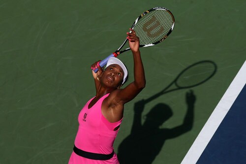 Venus Williams serves during her doubles match with Serena Williams against Julia Goerges of Germany and Arantxa Parra Santonja of Spain during day four of the 2009 US Open at the USTA Billie Jean King National Tennis Center on September 3. (AFP Photo) US Open Day 4