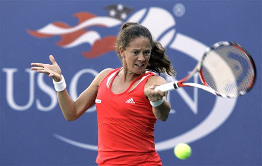 Patty Schnyder of Switzerland returns a volley to Tamira Paszek of Austria during their match at the US Open tennis tournament in New York on Saturday. US Open - Day 6