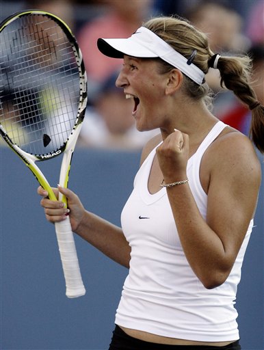 Victoria Azarenka of Belarus celebrates her victory over Martina Hingis of Switzerland after their match at the US Open tennis tournament in New York on Saturday. US Open - Day 6