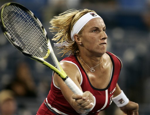 Svetlana Kuznetsova of Russia returns a shot to Anabel Medina Garrigues of Spain at the US Open tennis tournament in New York on Saturday. US Open - Day 6