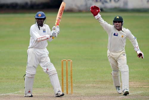 Kamran Akmal celebrates after the dismissal of Upul Tharanga during the first day of a three-day practice match between Pakistan and Sri Lanka Board XI in Colombo. (AFP Photo) Warm-up: PAK vs SL