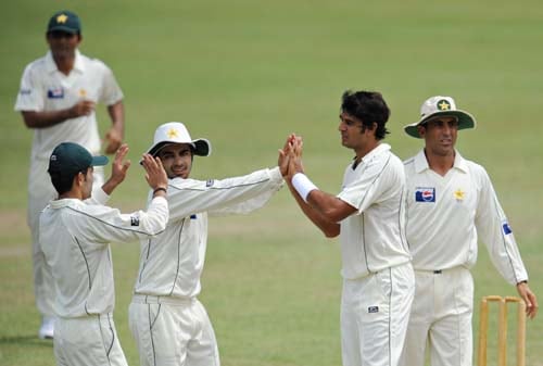 Abdur Rauf Khan celebrates with teammates after the dismissal of Tharanga Paranavitana during the first day of a three-day practice match between Pakistan and Sri Lanka Board XI in Colombo. (AFP Photo) Warm-up: PAK vs SL