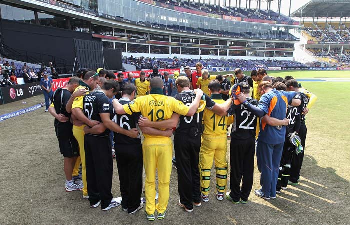 The New Zealand and Australian teams come together ahead of the second innings in a show of support for the memory of the victims of the Christchurch Earthquake during of the 2011 ICC World Cup Group A match between Australia and New Zealand at Vidarbha Cricket Association Ground in Nagpur. (Getty Images) World Cup: Australia vs New Zealand