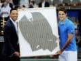 Photo : Will Smith presents Roger Federer 'Men in Black' suit