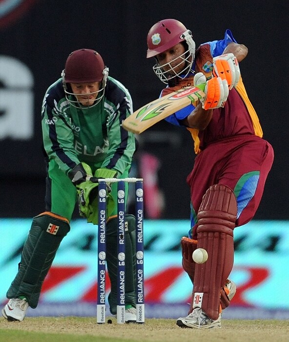 Niall O'Brien of Ireland look on as Ramnaresh Sarwan of west Indies plays a shot during their ICC World Twenty20 2010 match at the Providence Stadium in Guyana. (AFP Photo) T20 WC: WI vs IRE