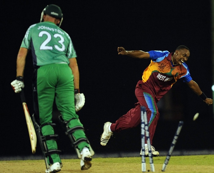 West Indies cricketer Dwayne Bravo celebrates the wicket of Trent Johnston of Ireland during their ICC World Twenty20 2010 match at the Providence Stadium in Guyana. (AFP Photo) T20 WC: WI vs IRE