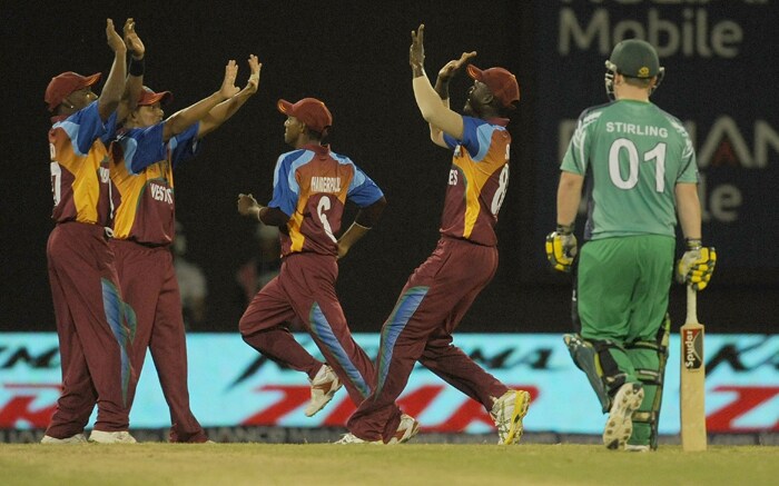 West Indies cricketers celebrate the wicket of Paul Stirling of Ireland during their ICC World Twenty20 2010 match at the Providence Stadium in Guyana. (AFP Photo) T20 WC: WI vs IRE
