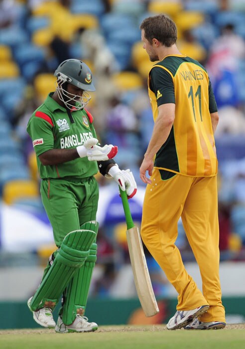 Dirk Nannes (R) celebrates after taking the wicket of Bangladeshi batsman Aftab Ahmed (L) during the ICC World Twenty20 Group A match between Bangladesh and Australia at the Kensington Oval. (AFP Photo) WT 20: Aus vs Ban