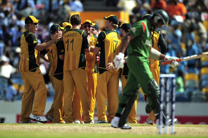 Dirk Nannes (C) celebrates after taking the wicket of Bangladeshi batsman Mahmudullah (R) during the ICC World Twenty20 Group A match between Bangladesh and Australia at the Kensington Oval. (AFP Photo) WT 20: Aus vs Ban
