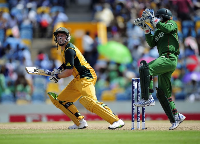 Michael Hussey eyes a shot past Bangladeshi wicketkeeper Mushfiqur Rahim during the ICC World Twenty20 Group A match between Bangladesh and Australia at the Kensington Oval. (AFP Photo) WT 20: Aus vs Ban