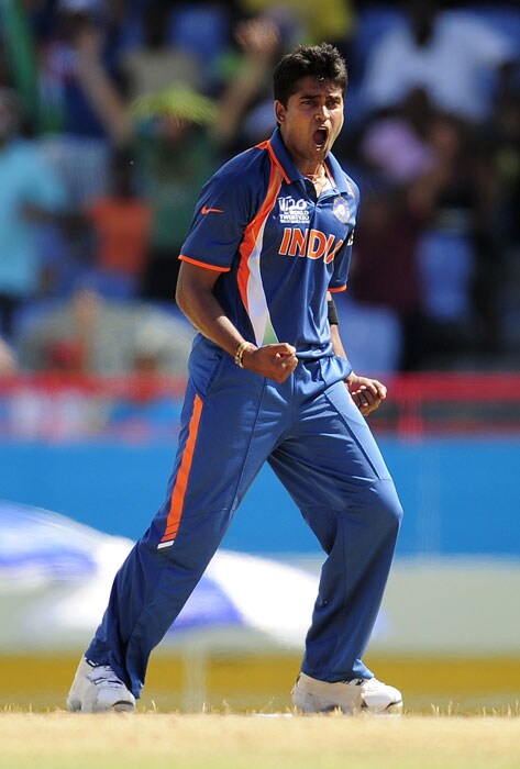 Vinay Kumar celebrates after taking the wicket of Sri Lankan Sanath Jayasuriya during the ICC World Twenty20 Super Eight match between India and Sri Lanka at the Beausejour Cricket Ground. (AFP Photo) WT20: Ind vs SL