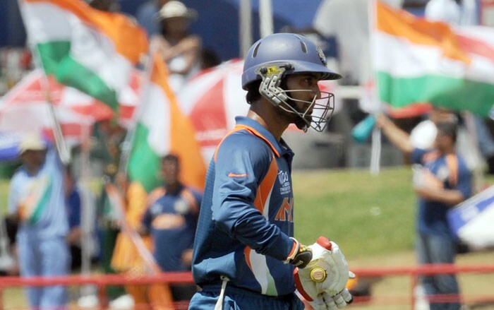 Indian cricketer Dinesh Karthik walks back after getting out during the ICC World Twenty20 Super Eight match between Sri Lanka and India at the Beausejour Cricket Ground. (AFP Photo) WT20: Ind vs SL